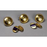 A pair of gilt and enamel cufflinks - bearing an armorial