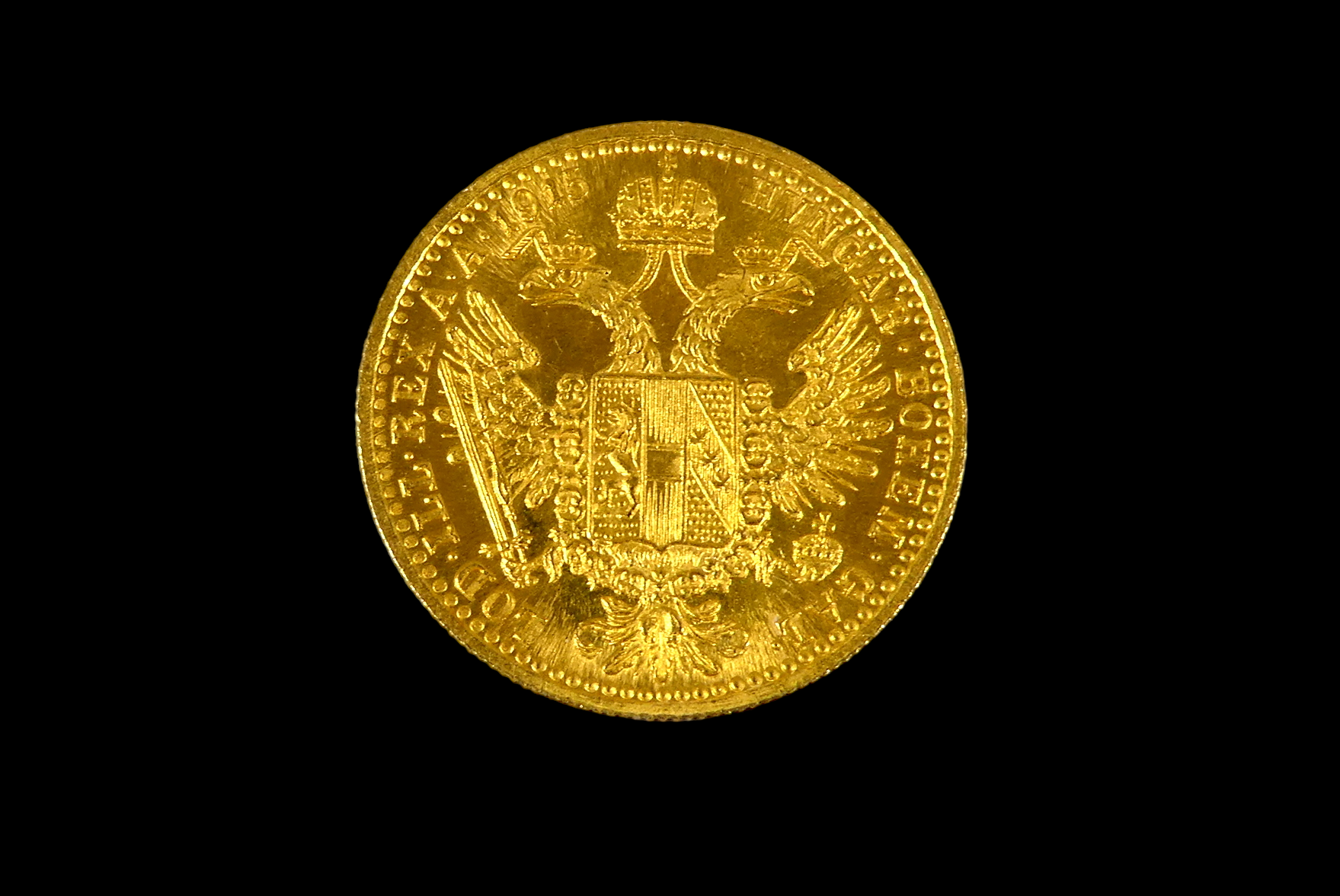 An Austrian Franz Joseph one Ducat gold coin dated 1915, laureate portrait reverse, arms within - Bild 2 aus 2