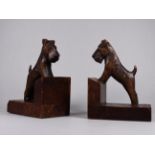 A pair of early 20th century Black Forest bookends - modelled in the form of Scottie dogs, height