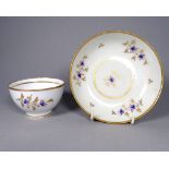 A Worcester Flight Period tea bowl and saucer - French blue sprig decoration with gilt rims, tea