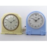 An Art Deco style electric mantel clock by Ferranti - with a blue plastic case, height 15cm,