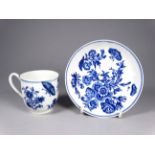 An 18th century Worcester tea cup and saucer circa 1778 - blue and decoration of flowers and
