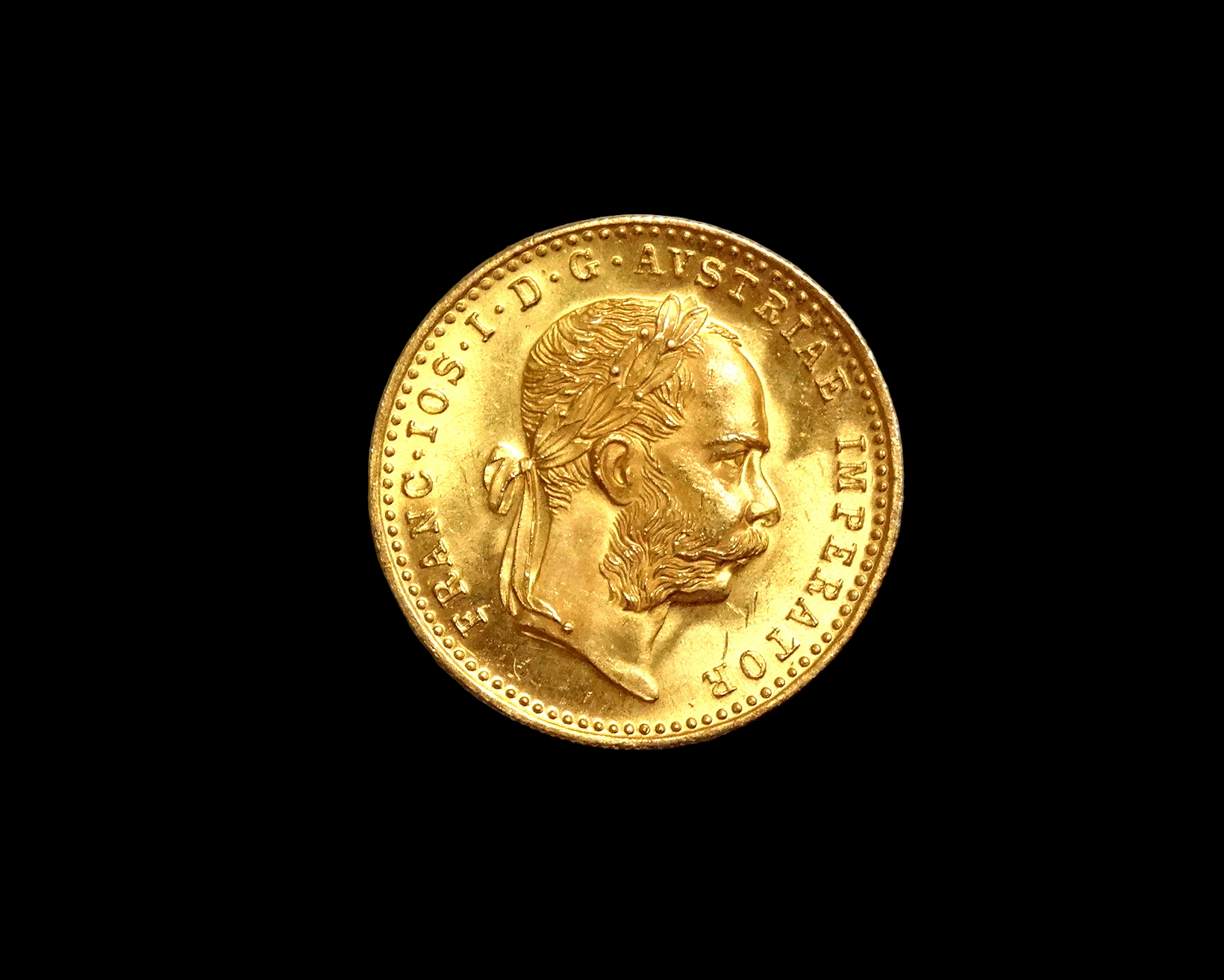 An Austrian Franz Joseph one Ducat gold coin dated 1915, laureate portrait reverse, arms within