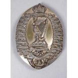 A Royal Irish Rifles silver cross-belt badge - Birmingham 1923, with associated oval back-plate,