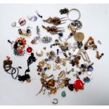 A bag of costume jewellery - to include some silver.