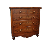 A Victorian mahogany bow front chest of drawers - with an arrangement of two short and three long