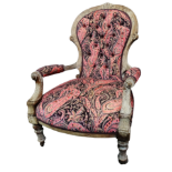 A late Victorian walnut framed spoon back button upholstered open armchair - covered in pink paisley