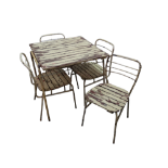 A mid 20th century Parisian cafe style table and four chairs - the cream painted wooden lathes