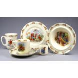 A Royal Doulton Bunnykins child's dinner service - including a bowl, an eggcup, a mug, a plate and a