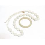 A white jade beaded necklace - with a 9ct yellow gold clasp, length 80cm, together with a jade