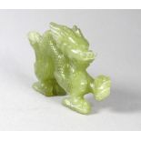 A green jade dragon - length 11cm.