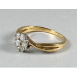 A 9ct gold and diamond cluster set ring - size M/N, weight 2g.