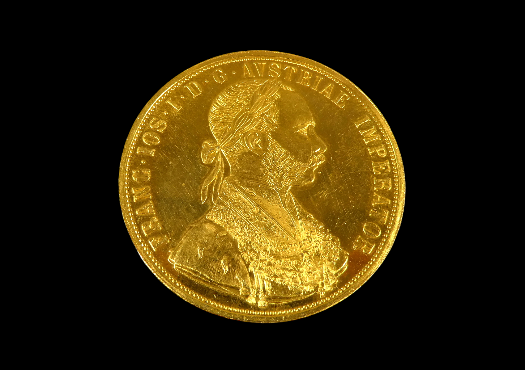 An Austrian Franz Joseph four Ducat gold coin - dated 1915, laureate portrait reverse and arms