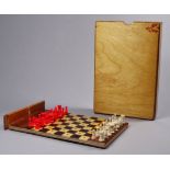 A late 20th century Jaques travelling chess set - contained within a beech and plywood box, with