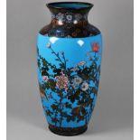 A Meji period Japanese cloisonne vase - of baluster form and decorated with flowers, birds and