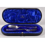 A silver christening fork and spoon - Sheffield 1907 Atkin Bros., boxed, 48g