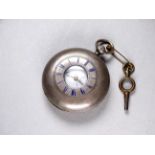 A silver half hunter pocket watch - by W. Cage, London, the engine turned case with blue enamel