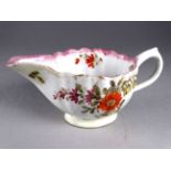 A Bow cream jug - circa 1754, decorated with floral sprigs and a pink band to rim, width 11cm