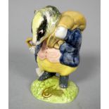 A Beswick Beatrix Potter figure 'Tommy Brock' - height 9cm.