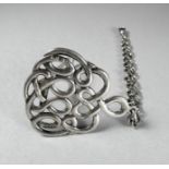 A Victorian silver chatelaine - with cast and pierced knot design, Chester 1897, sponsor's mark