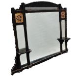A late Victorian ebonised overmantel mirror - in the manner of The Aesthetic Movement, the central