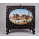 A 19th century Anglo-Indian easel framed table picture - possibly the Taj Mahal and fort, oval
