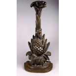 A 19th century brass doorstop - modelled in the form of a pineapple with a weighted base, height
