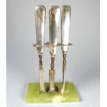 An Art Deco silver handled three piece manicure set - Birmingham 1915, in a silver and green onyx