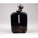 A late 19th century glass and silverplated hip flask - black leather clad with a hinged screw