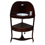 A 19th century mahogany corner washstand - with a raised back and central tier incorporating a