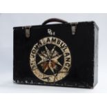 A St John's Ambulance First Aid box - black painted tin with St John's logo, containing some