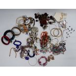 A bag of costume jewellery.