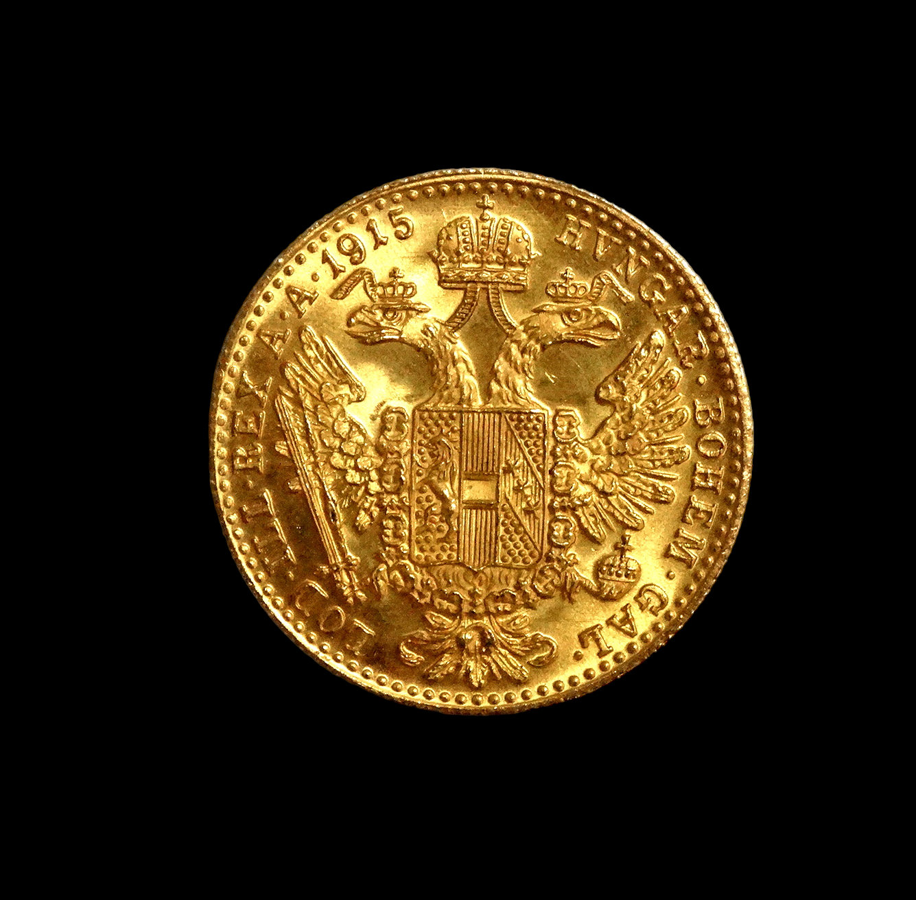 An Austrian Franz Joseph one Ducat gold coin dated 1915, laureate portrait reverse, arms within - Bild 2 aus 2