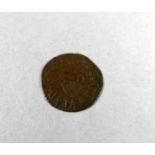 A Charles 1 Irish farthing.