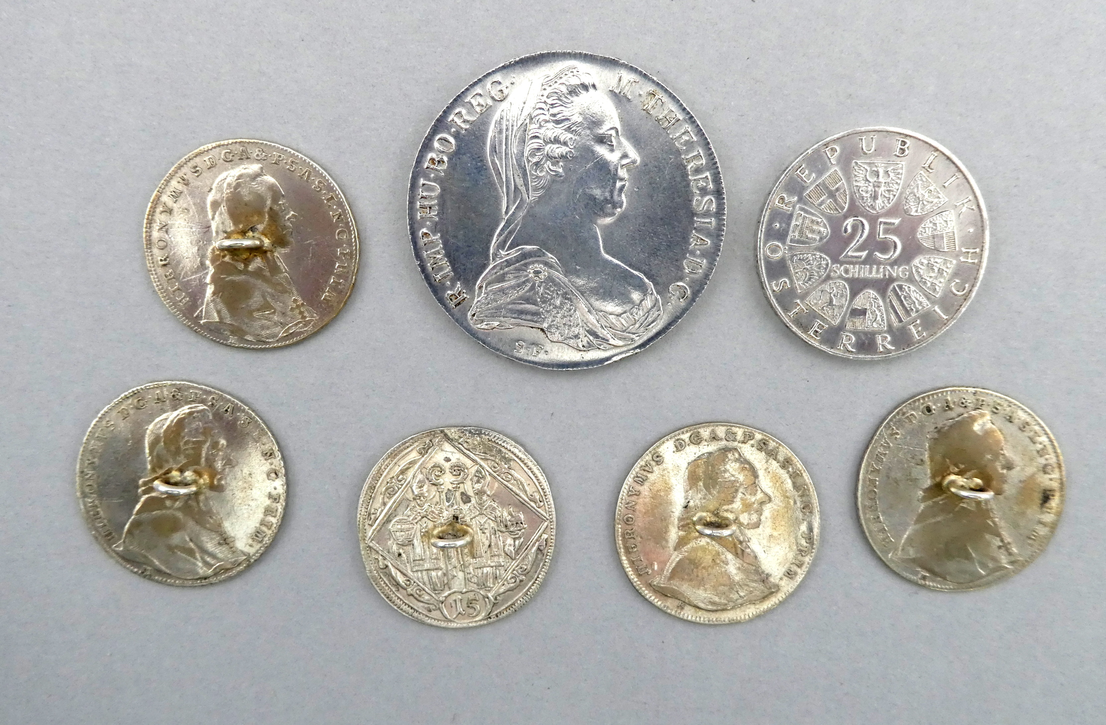 Austrian Maria Theresa thaler - together with five one thaler silver coins now as buttons with