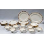 A 20th century Wedgwood dinner service - for eight place settings retailed by T. Goode & Co.,