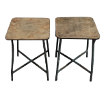 A pair of mid 20th century stools - square plywood seats, raised on steel tubular legs, joined by an