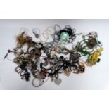 A quantity of costume jewellery - including an open heart shaped necklace