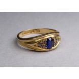 A sapphire and diamond dress ring - set in 18ct yellow gold band, size K/L, weight 4.7g.