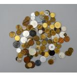 A quantity of assorted tokens and medallions.