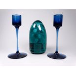 A pair of contemporary blue glass candlesticks by Wedgwood - the sockets on slender stems and