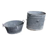 An early 20th century galvanised water butt - of oval form with circular lifting lugs, 59 x 49cm,