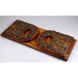 A Victorian walnut and brass mounted book trough - the pierced and engraved mounts decorated with