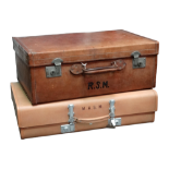 An early 20th century tan leather travelling trunk - marked with ownership initials and with