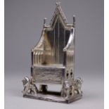 A silver Coronation chair - indistinct marks, height 7.7cm, width 4cm, weight 41g.