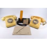 A British Telecom 700 Series cream telephone - together with another and a Bang & Olufsen BeoCom