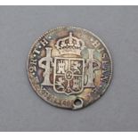 A Mexican 2 Reales coin, dated 1809.