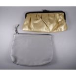 A gold leather clutch bag - designed for Lancome, with anodised catch and frame, width 26cm,