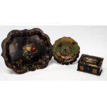 A Victorian papier mache stationery box - of rectangular form decorated with flowers within a gilt