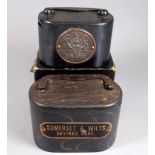 A Somerset & Wilts. savings bank - height 8cm, with apertures for notes and coins, together with a